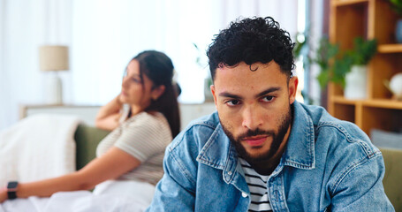 Obraz premium Thinking, man and couple with argument, home or miscommunication for people in relationship. Conflict, contemplating and newlyweds with tension, house and mad for controlling behaviour in marriage