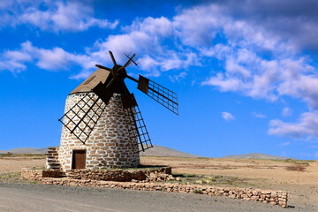 Fototapeta premium Fuerteventura mill, Molino de Tefia, Canary islands, Spain. Lovely traditional and restored windmill.