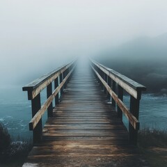 Fototapeta premium A wooden bridge leading into the mist, symbolizing uncertainty, new beginnings, and self-discovery.