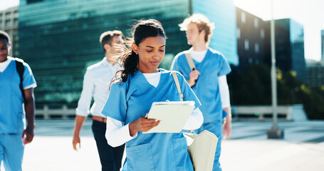 Medical, nurse and woman with tablet in city for education, learning or wellness email. Digital technology, outdoor and healthcare student reading schedule, exam results or travel to college campus