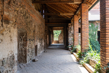 Old stone corridor in the abbey. Interior of Rosa Coeli Cathedral in the Czech Republic.