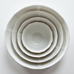 Obraz premium Set of white ceramic plates in various sizes