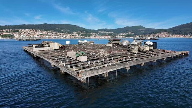 Bateas traditional aquaculture platform to cultivate mussels in the sea of Rias Baixas, Galicia (Spain)