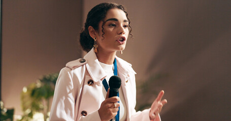 Woman, presentation and talking at convention with microphone, speech and discussion at workshop....