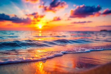 Fototapeta premium Serene Sunset Ocean: Pink & Orange Hues Reflecting on Calm Water - Tilt-Shift Photography