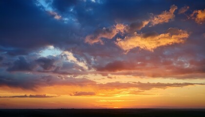 Obraz premium beautiful cloudy sunset colorful sky over horizon