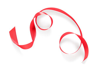 Fototapeta premium Beautiful satin red ribbon isolated on white background