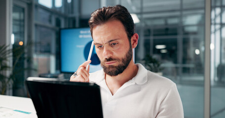 Fototapeta premium Thinking, business man and tablet in office for problem solving or reading in startup. Technology, serious and worker with creative ideas, insight or content writer search for inspiration at night