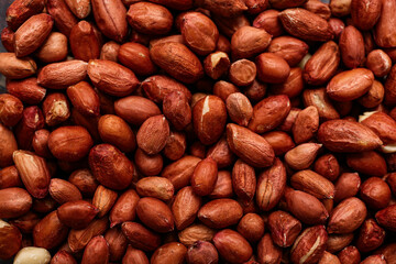 Texture of fresh peanuts as background, closeup
