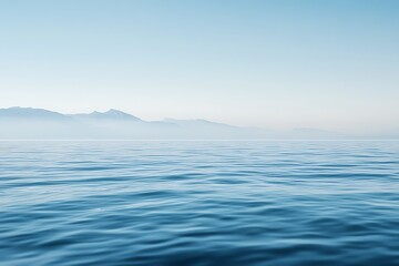Obraz premium a serene expanse of deep blue ocean stretching to the horizon, meeting a clear, light blue sky, creating a calming and tranquil seascape perfect for conveying peace and vastness
