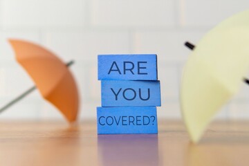 A small umbrella with the words 