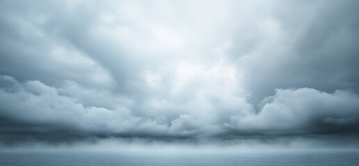 Obraz premium Moody Seascape with Dramatic Clouds and Approaching Storm