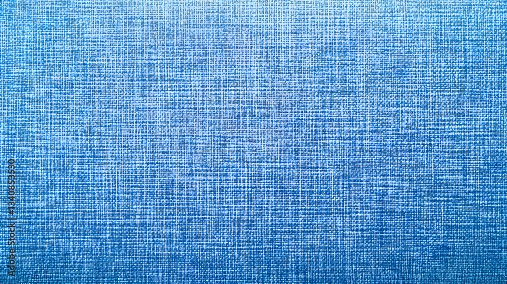 Poster a textured blue background featuring a woven pattern, creating a visually appealing and calming effe