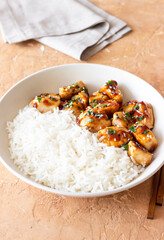 Chicken in teriyaki sauce with rice. Asian food. Healthy eating.
