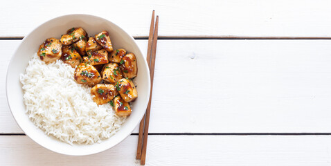 Chicken in teriyaki sauce with rice. Asian food. Healthy eating.