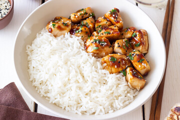 Chicken in teriyaki sauce with rice. Asian food. Healthy eating.