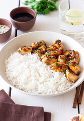 Chicken in teriyaki sauce with rice. Asian food. Healthy eating.