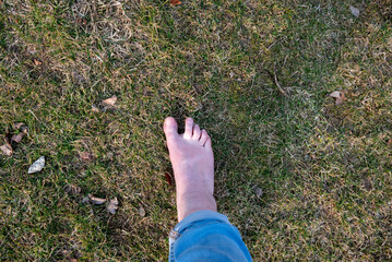 celebrating go barefoot day by walking without shoes