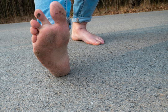 celebrating go barefoot day by walking without shoes