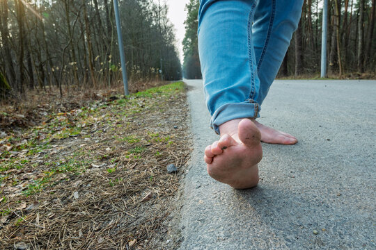 celebrating go barefoot day by walking without shoes