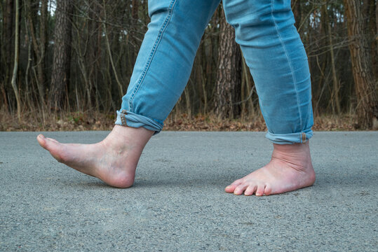 celebrating go barefoot day by walking without shoes