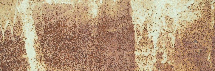 Old rusty metal texture. Rust on the surface of the iron wall. Panoramic background for grunge...