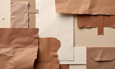 A contemporary mixed-media piece featuring a collage of mocha mousse-colored fabric and paper. The texture of the materials adds dimension,