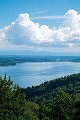 Obraz premium there is a view of a lake and a bridge from a hill