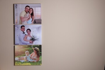 Canvas with different printed photos on beige wall indoors, space for text