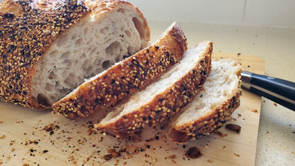 loaf of sliced multi grain sourdough bread