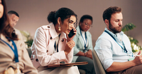 Audience, distraction and phone call with business people in conference room of convention center...