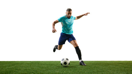 Naklejka premium High-speed movement of focused football player running forward, controlling ball with precision, eyes locked on goal, against white backdrop. Concept of team effort, discipline, championship, skill.