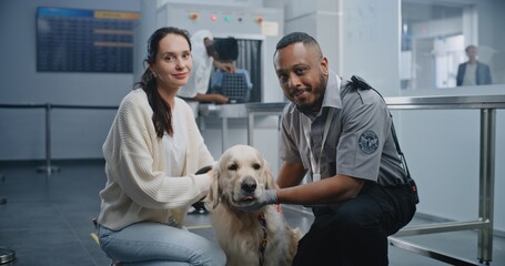 Airport Terminal: Portrait of Woman and African American TSA Officer Sitting Together with Golden...