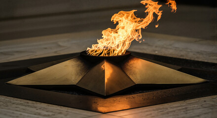Eternal flame burning in star-shaped monument