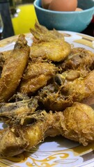 Deliciously Fried Chicken Pieces Arranged on a Decorative Plate