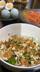 A bowl of food is prepared for a meal