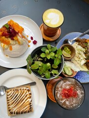 A table arrangement showcasing a variety of delicious food and drinks
