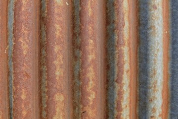 Rusty corrugated metal roof wall texture background.