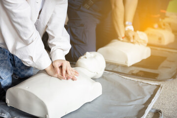People use CPR training manikin
