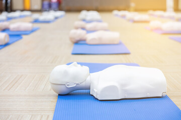 People use CPR training manikin