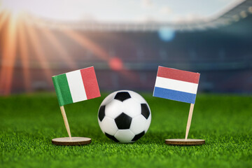 italy and netherlands football rivalry with national flags, soccer ball on green field, and stadium backdrop, representing competitive sports spirit