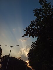 Sunrays merging out of clouds