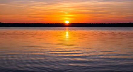 Fototapeta premium A breathtaking sunset over a tranquil lake, reflecting warm orange and pink hues, AI Generated