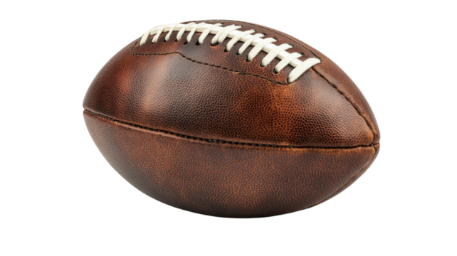 Vintage leather football resting on a surface ready for an exciting game day