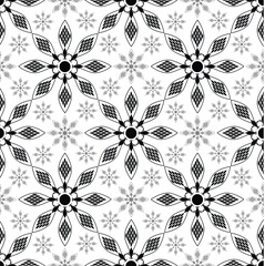 Beautiful black and white geometric blossom pattern for fabric and background, seamless pattern.