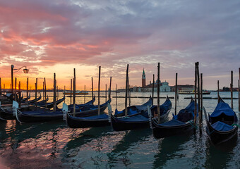 Amazing sunrise on the Grand Canal in Venice.The Church San Giorgio Maggiore on the  background