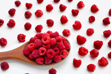 Fresh raspberry on white background.