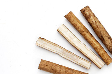 Burdock Root (Gobo) on white background.
