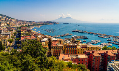 Panoramic view over Naples and harbour with Mount Vesuvius in Naples, Italy.