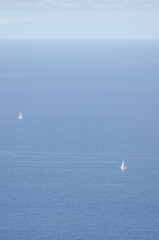Sailing boats in the west of the island of La Palma. Mazo. Canary Islands. Spain.